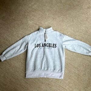 New never worn sweat shirt